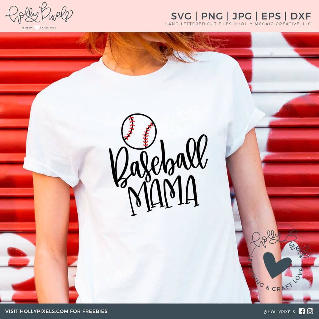 A white t-shirt on a red-haired slender girl with the inscription Baseball Mom and a pattern of a baseball.