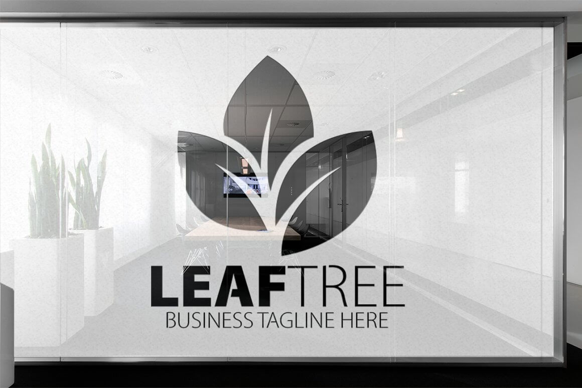 Gray leaf tree logo on ash-tinted glass.