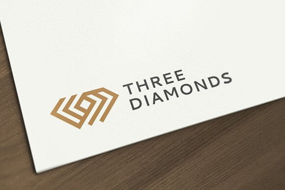 A small logo of a triple gold diamond with the heading "Three diamonds" to the right on a white sheet below.