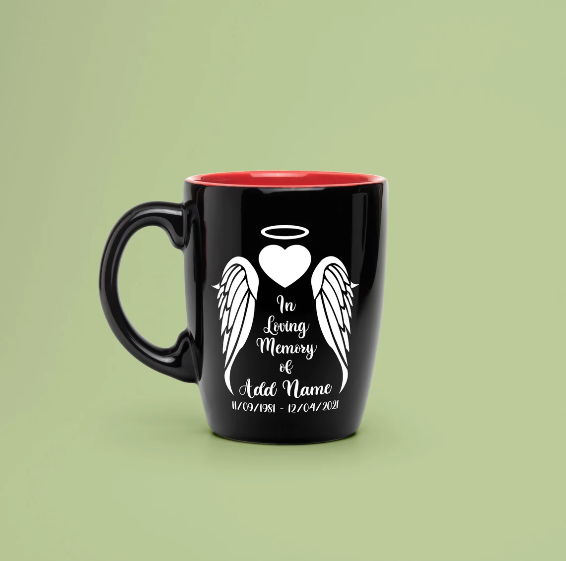 A print of angel wings on a black cup.