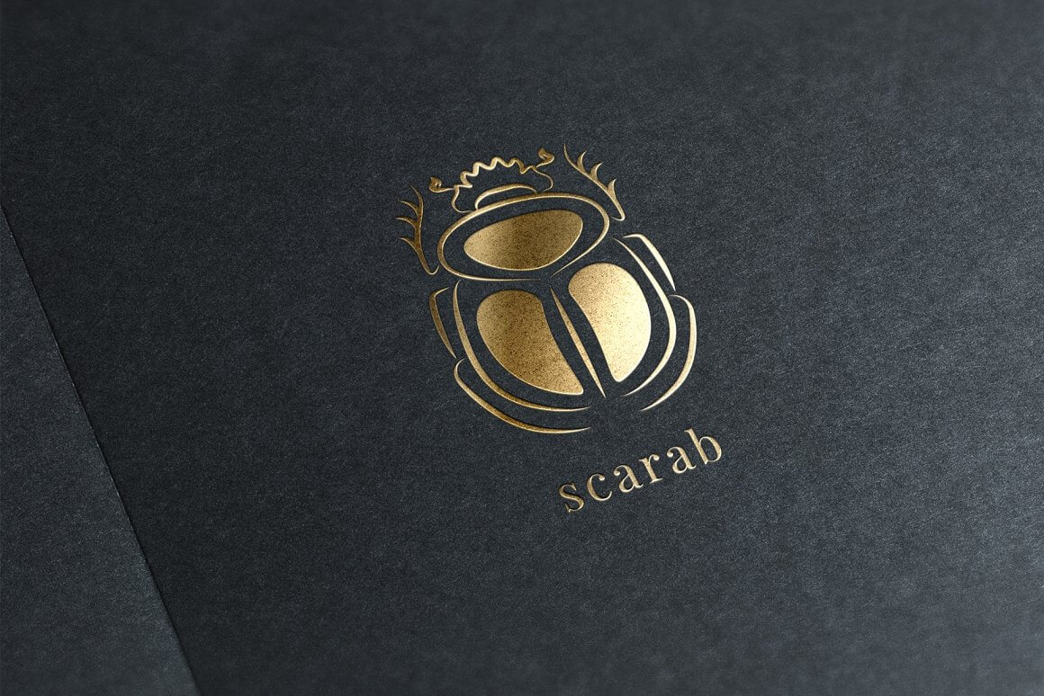 Logo with the image of a golden scarab on a black background.