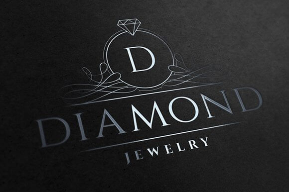 Large black diamond jewelry logo with beautiful swirls in silver.