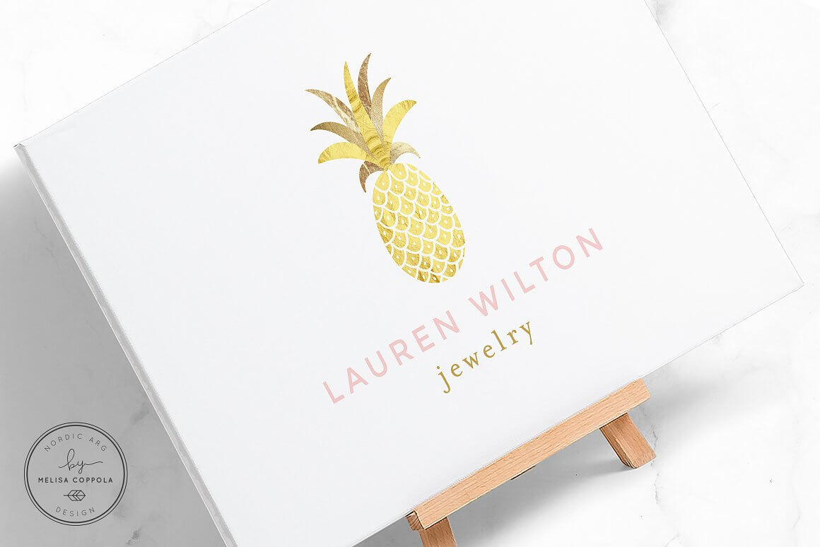 Artwork with massive golden pineapple logo on white canvas with "Lauren Wilton, Jewelry" lettering.