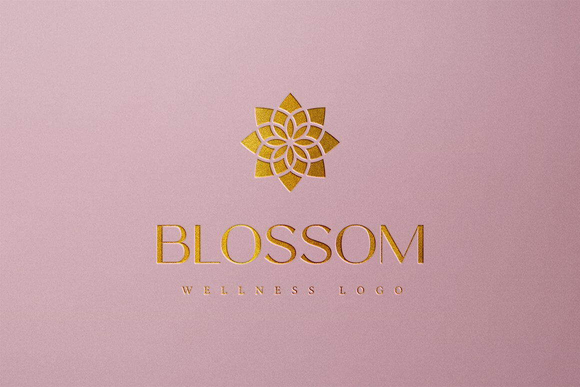 Logo with the image of a golden lotus and the inscription Blossom on a pink matte background.