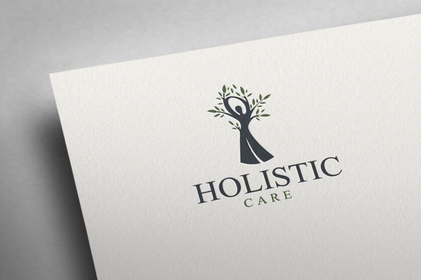 On a white sheet of paper there is a logo in the form of a tree-girl and the inscription Holistic care.