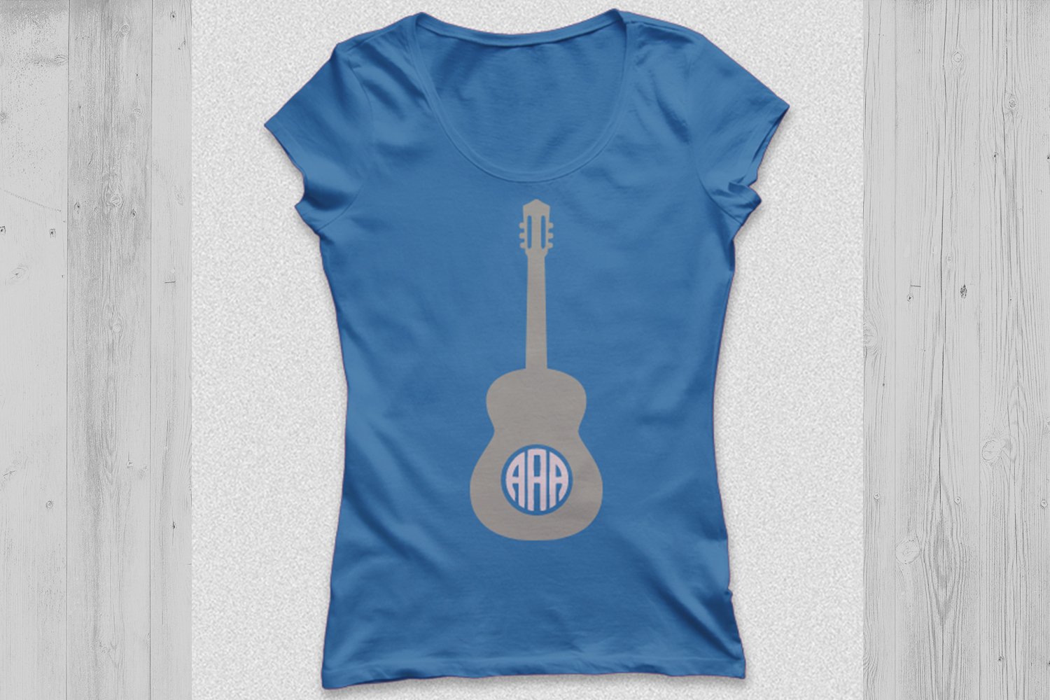 Women's t-shirt with a gray acoustic guitar print.