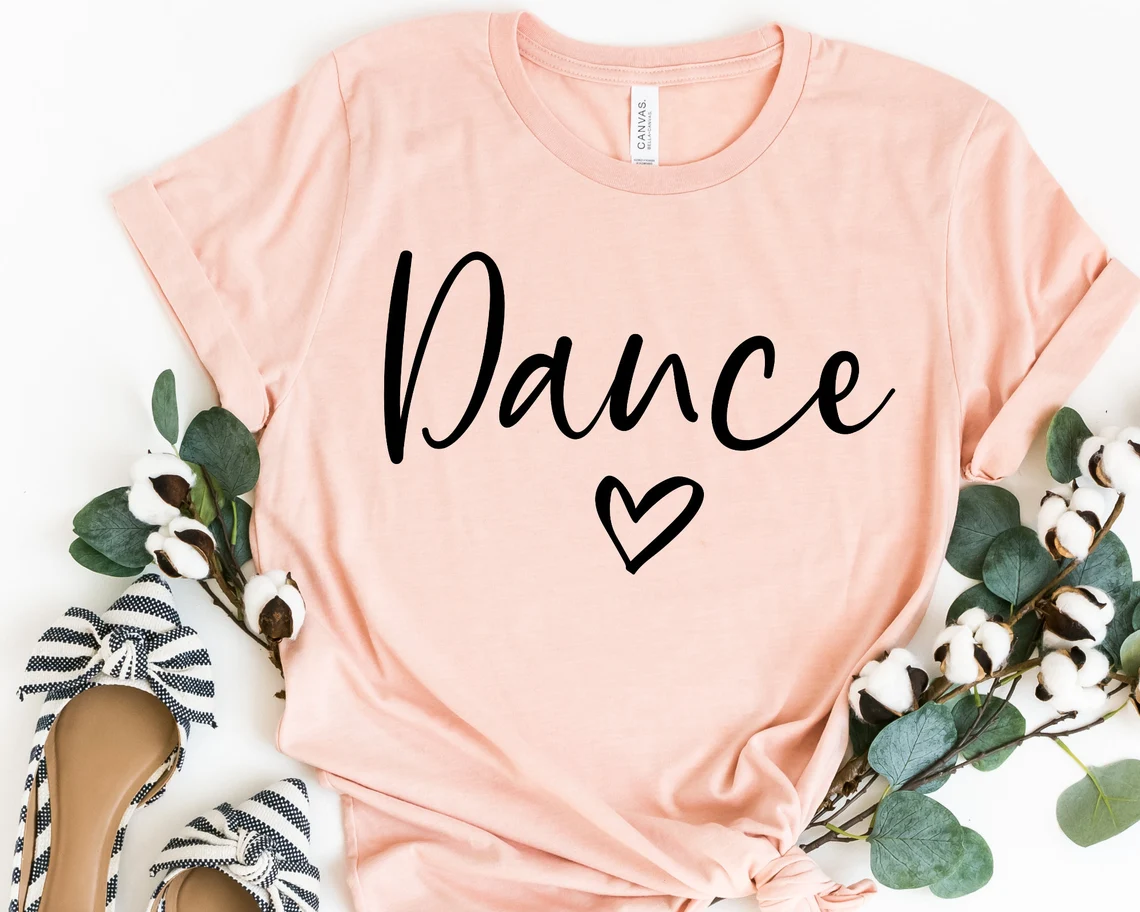 Peach t-shirt with a love for dancing.