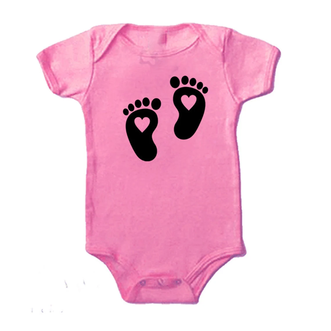 Pink children's clothes with footprints.