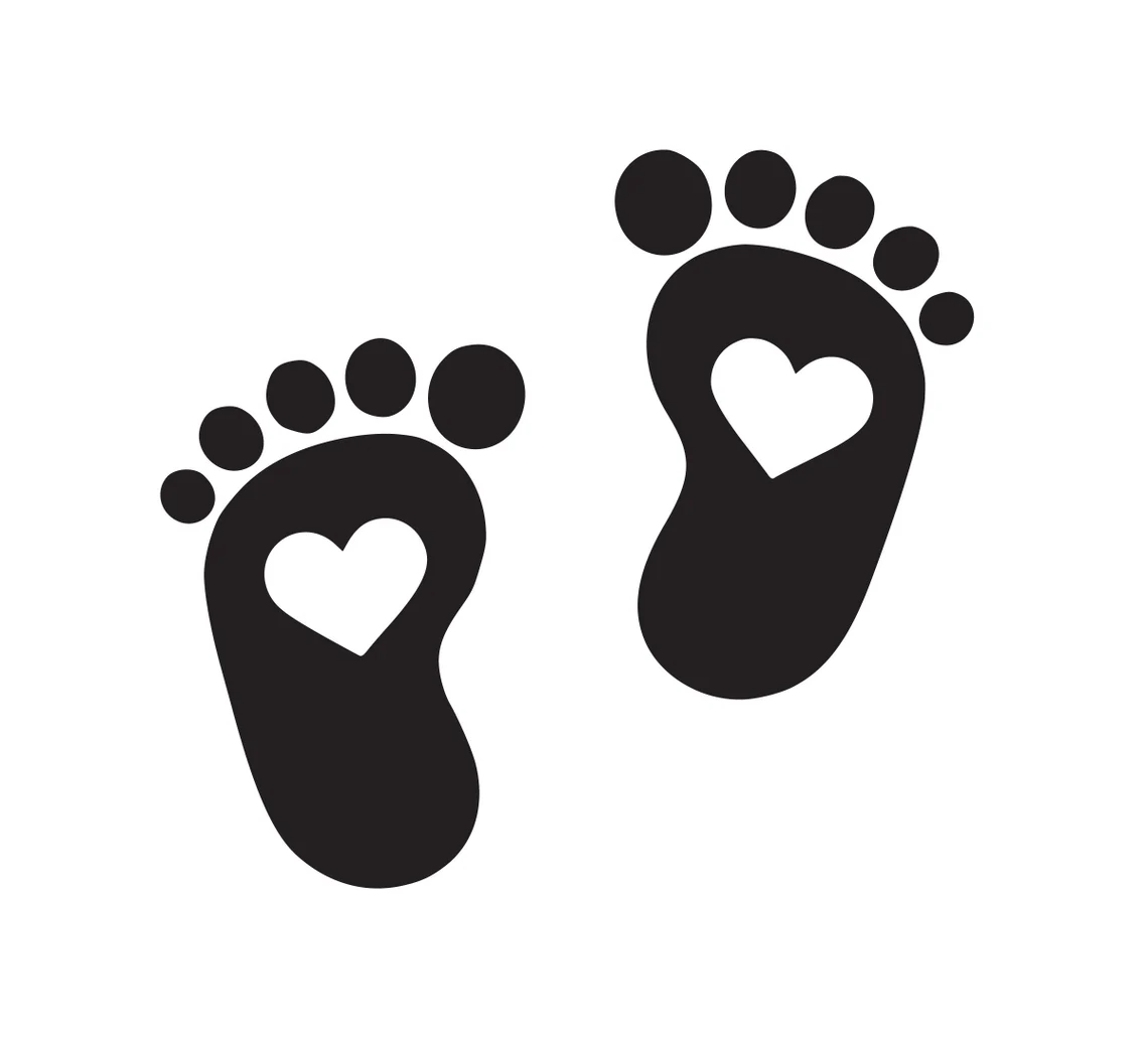 Black children's feet with a heart.