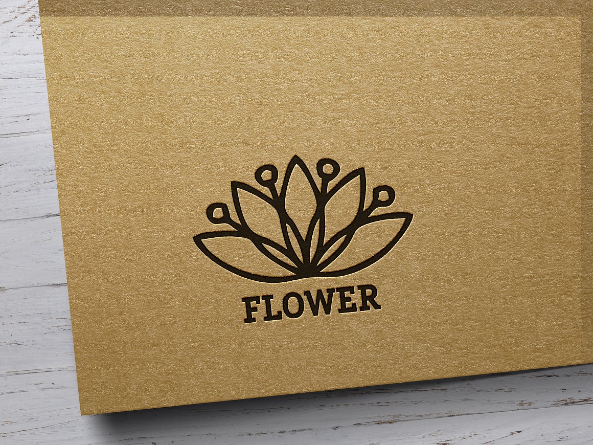 Dark brown logo with the image of a blooming lotus and the inscription flower on a beige background.