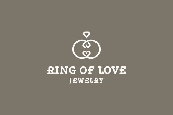 White logo for jewelry on a gray background.