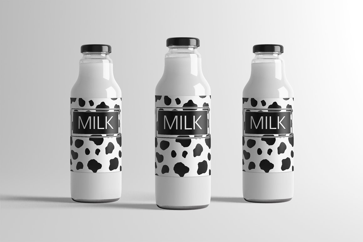 A white bottle with a black name milk and a cap.
