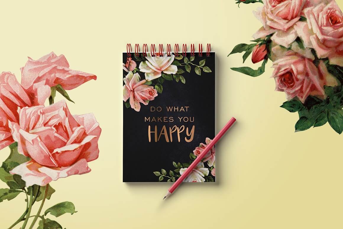 Incredibly beautiful roses and the inscription "Do what makes you happy" are drawn on a black notebook.