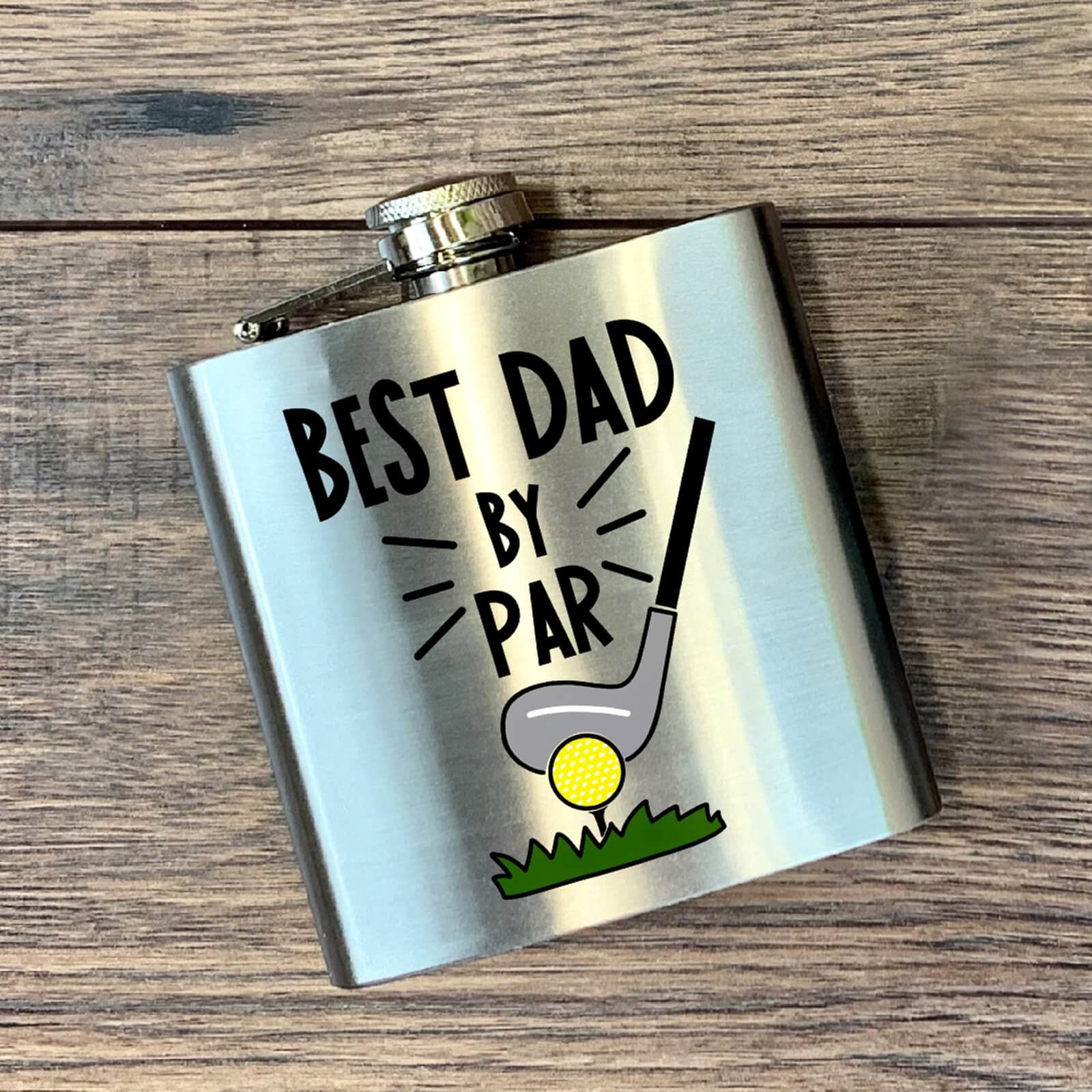 The inscription "The best dad at face value" on a flask for alcohol.
