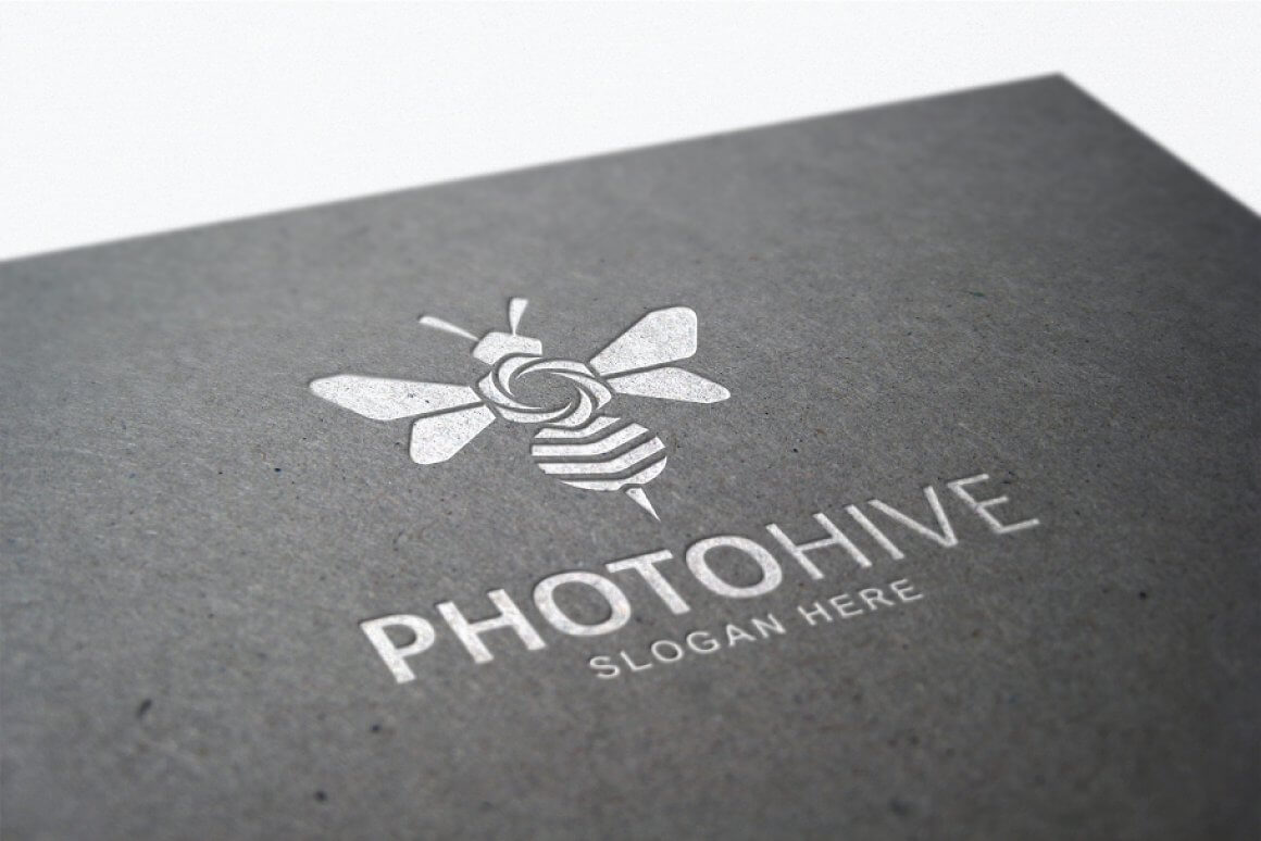Light gray bee logo on a gray background.