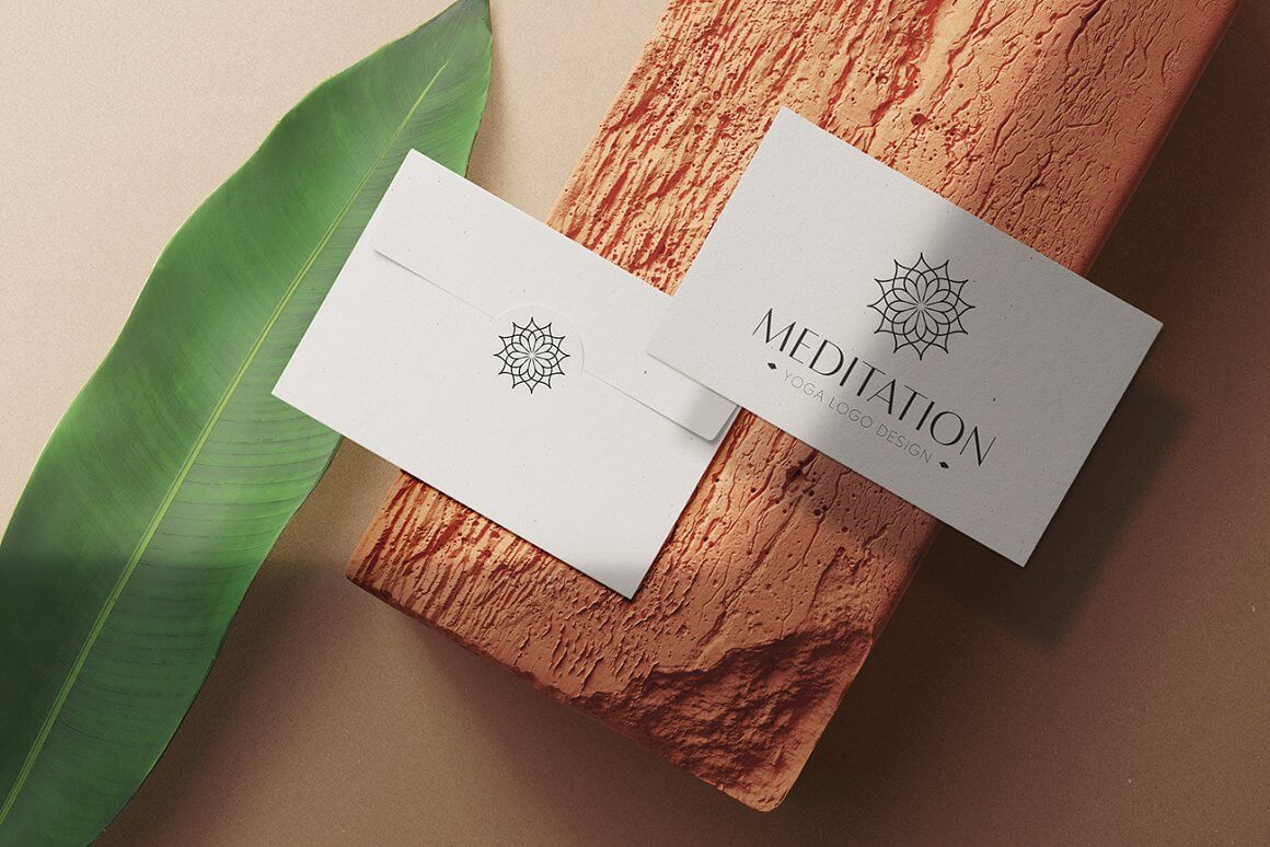 White business card with the lotus logo and the inscription Meditation.