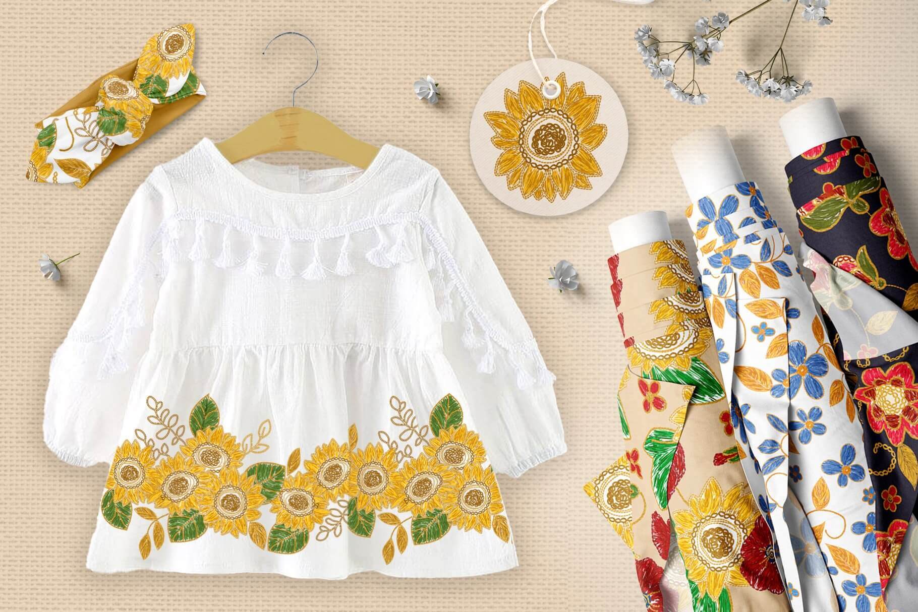 Yellow sunflowers with spikelets and green leaves are embroidered on a white shirt.