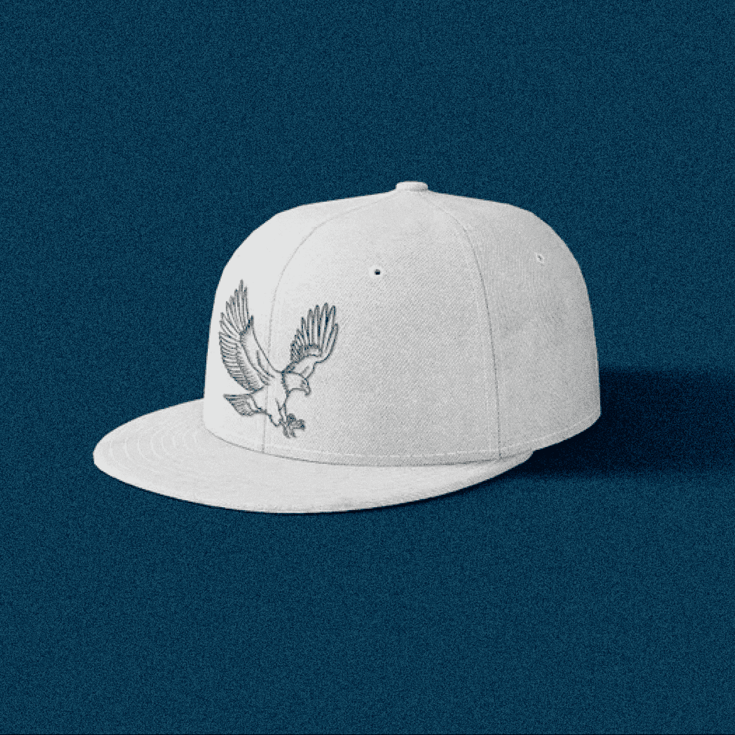 White hat with a bird embroidered on it.