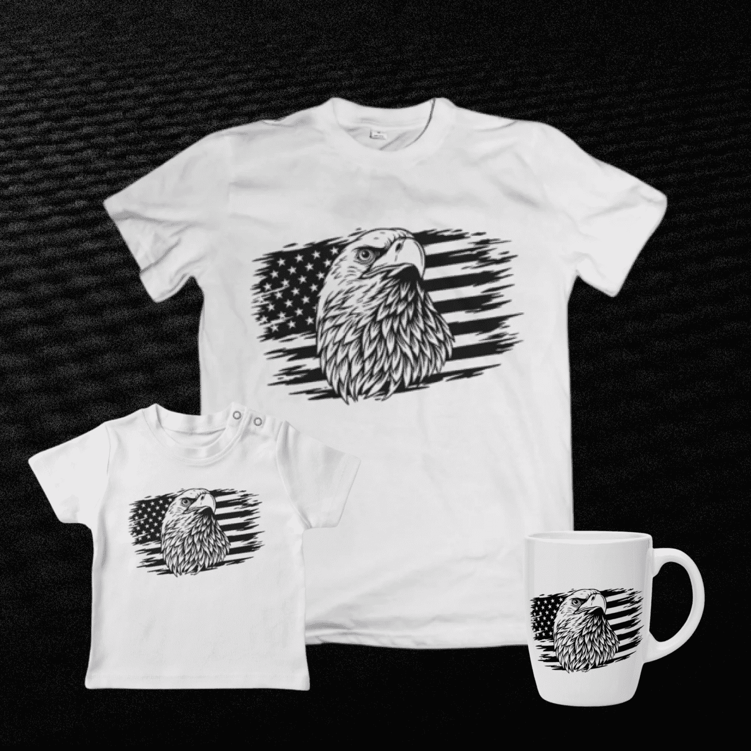 White t - shirt with an eagle on it next to a coffee mug.