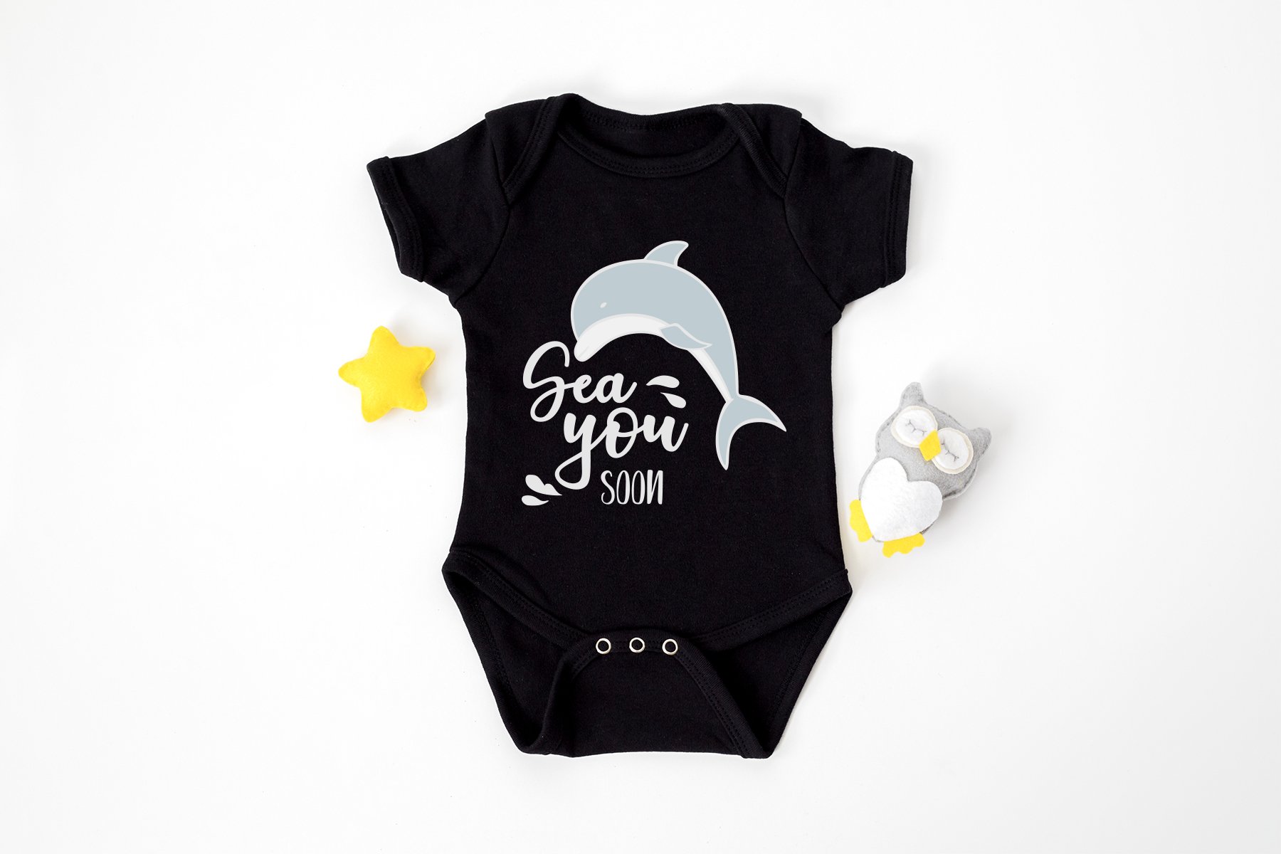Baby bodysuit with a dolphin on it.