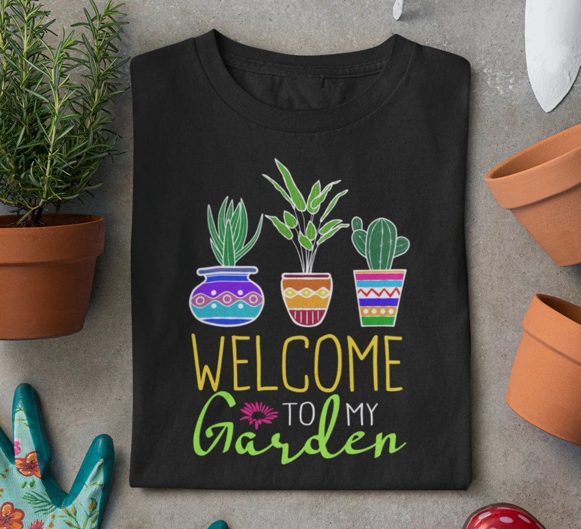 Black t-shirts with plants and flower pots.