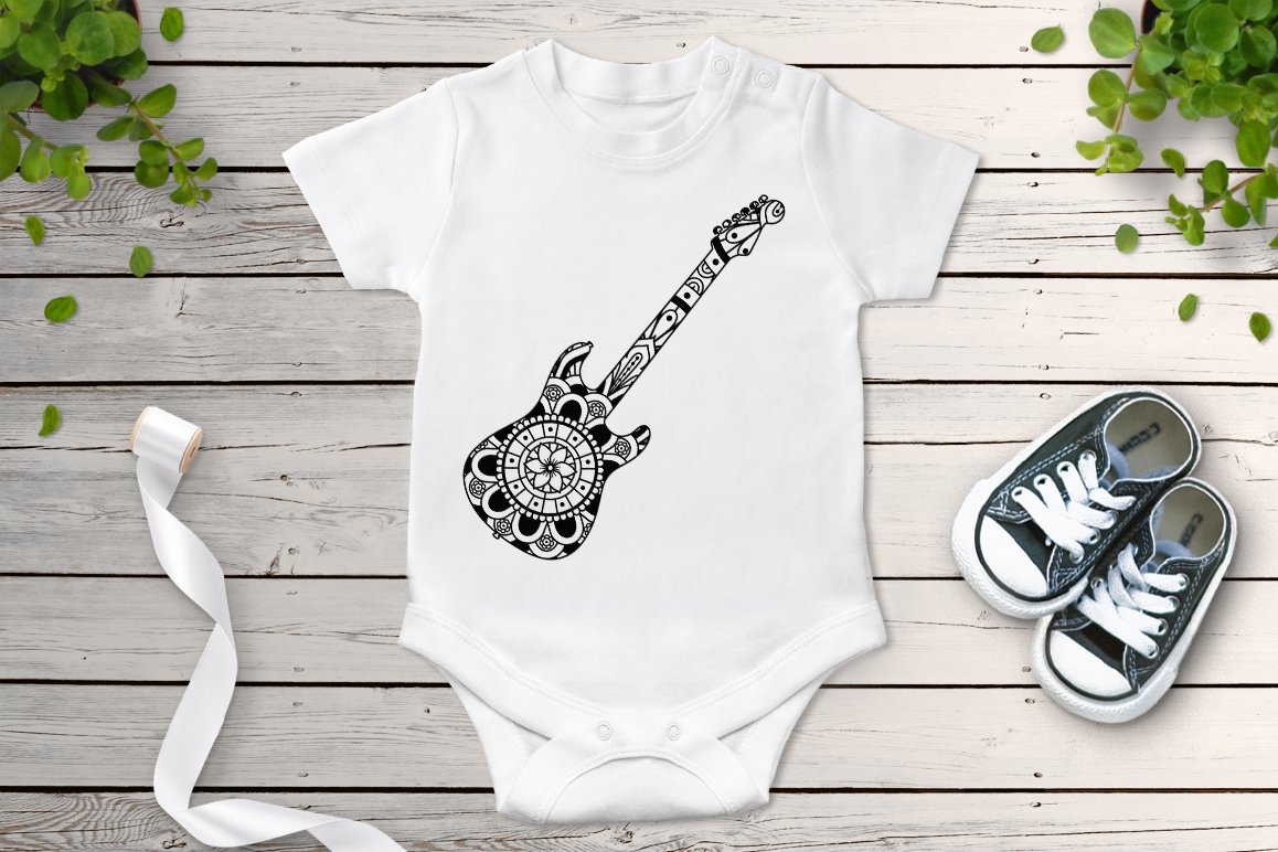 The image of a guitar on children's clothes.