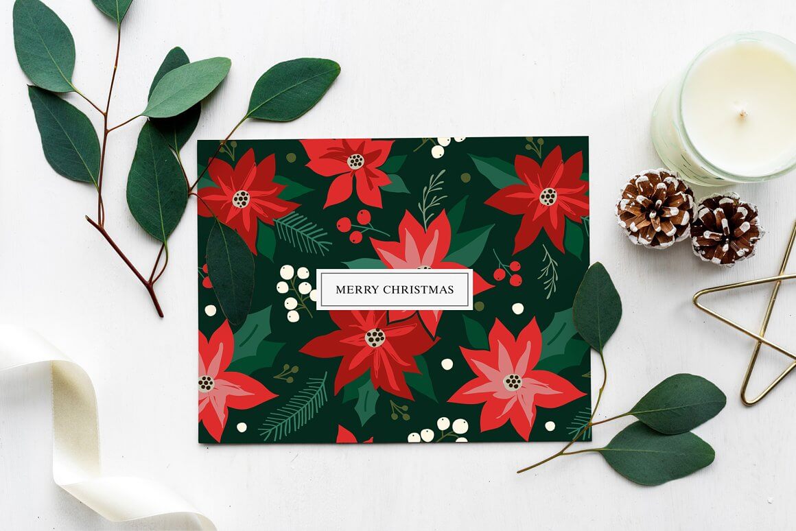 Black envelope with red poinsettia flowers.