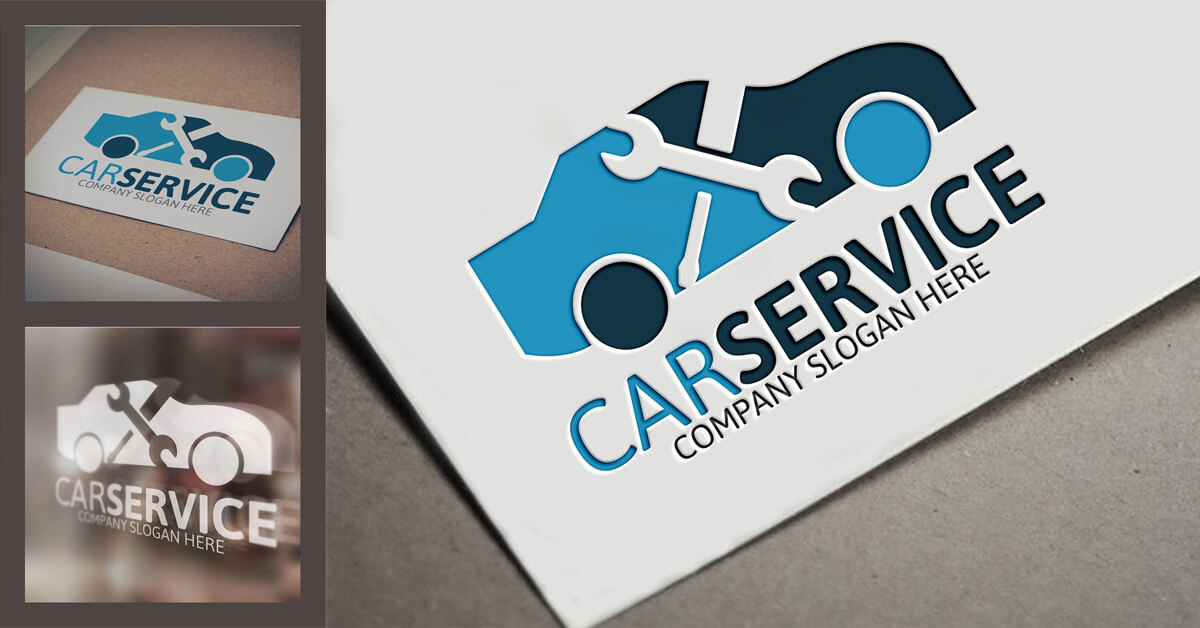 A large embossed blue and blue car service logo on white paper, a white logo on a blurry background and one business card on white paper.