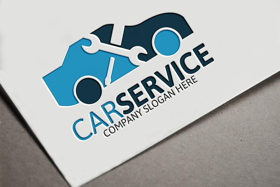 Large embossed blue and blue car service logo on the corner of white paper.