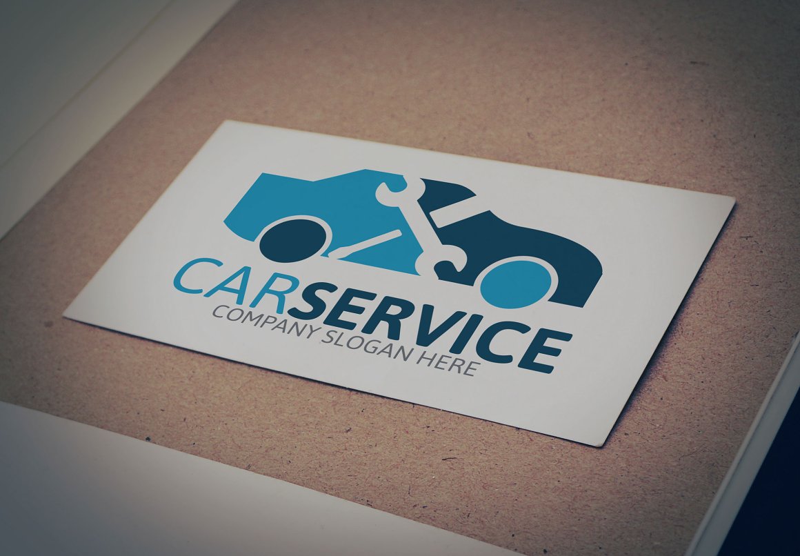 Blue and blue car service logo on a white business card.