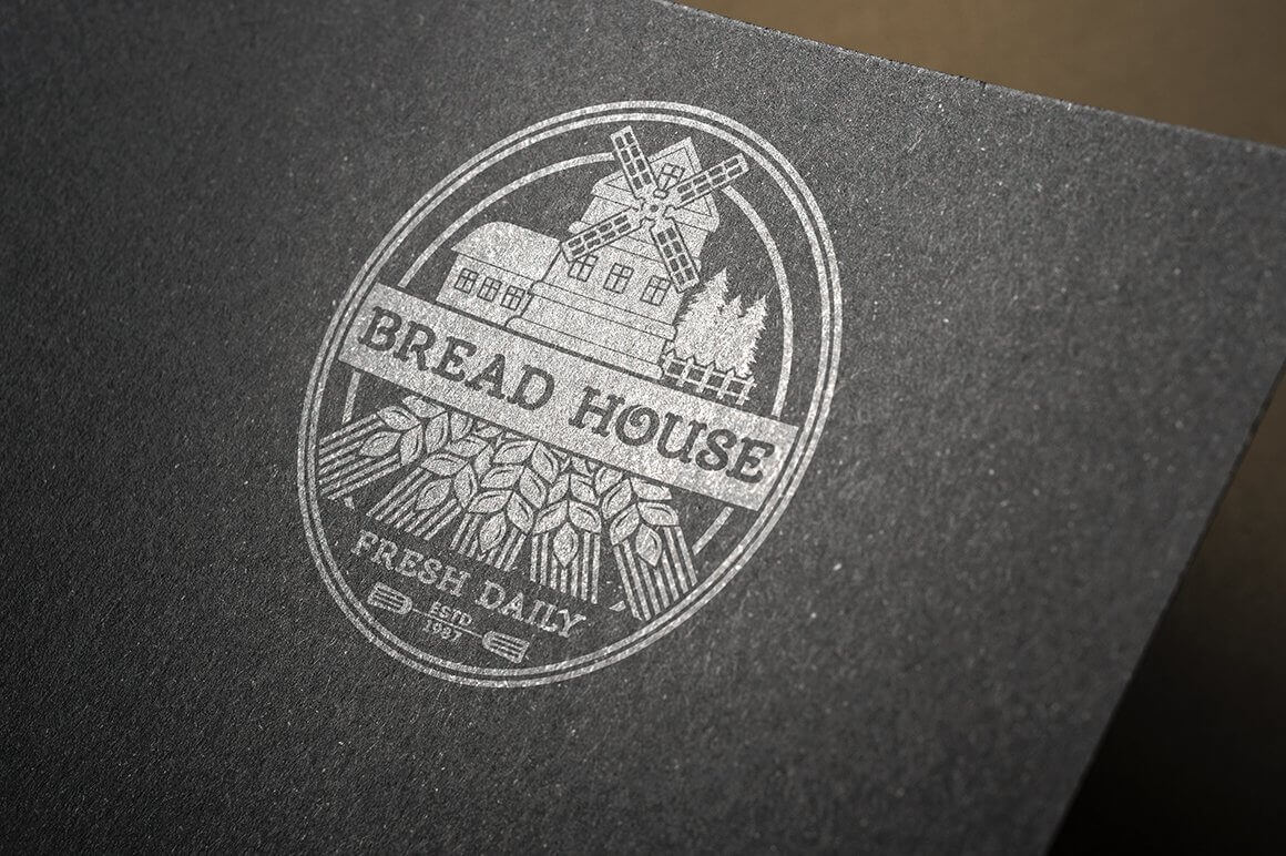 Large silver "Bread House, fresh daily" logo on black paper.