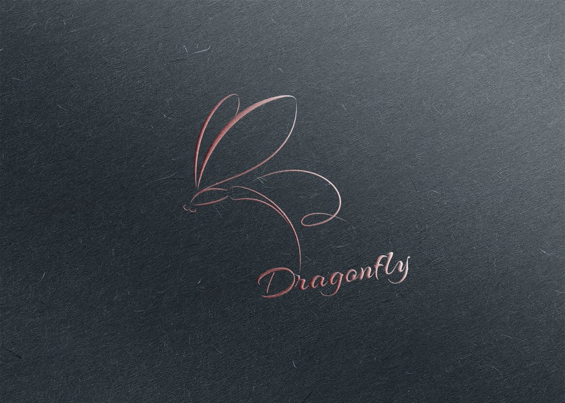 Pink dragonfly logo on a dark gray textured background at a slight angle.