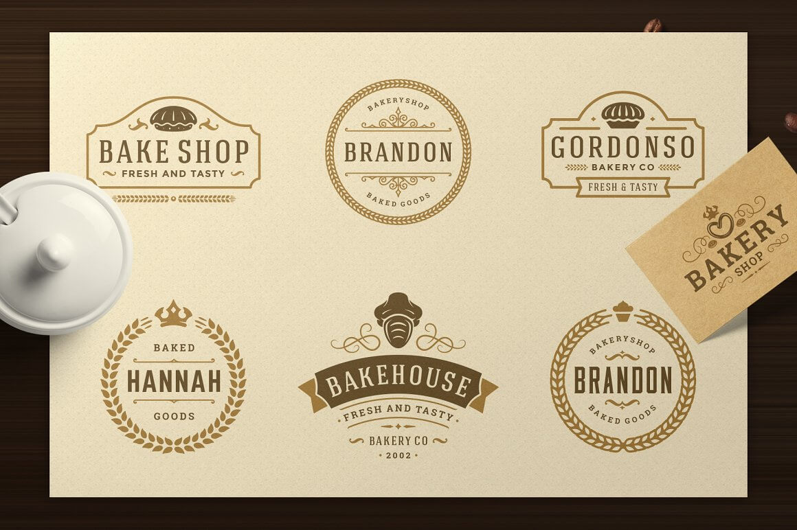 Six brown olive brand logos of Bake Shop, Brandon, Gordonso, Hannah, Bake House on a yellow sheet on a wooden table.
