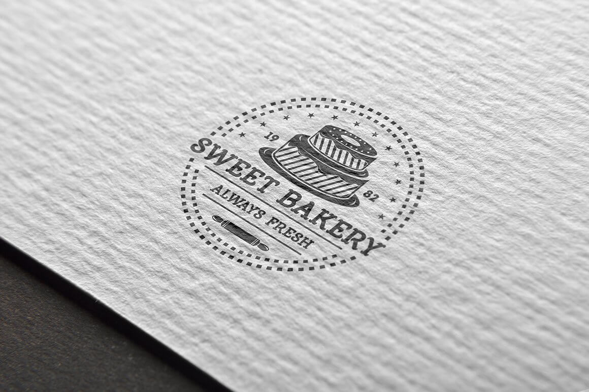 Gray "Sweet Bakery, Always Fresh" logo on white cardstock.