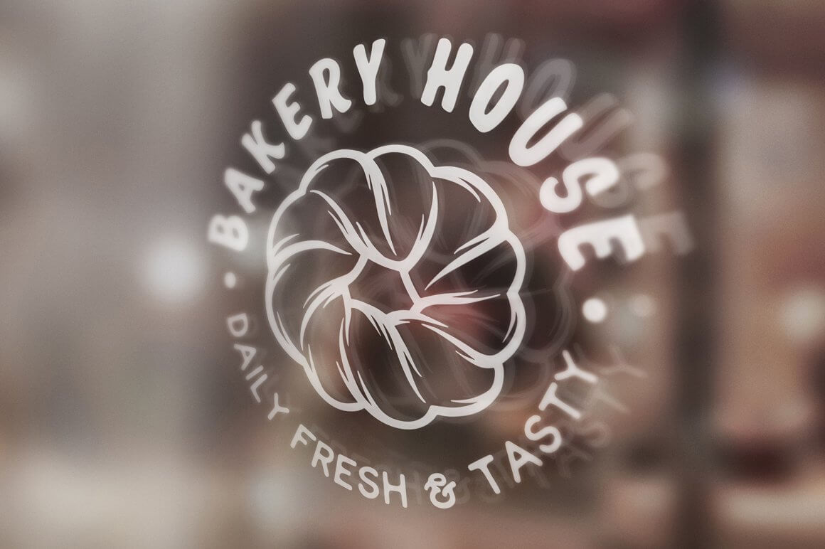 Mockup of a window signboard with the bakery logo "Bakery House, Daily fresh & tasty".