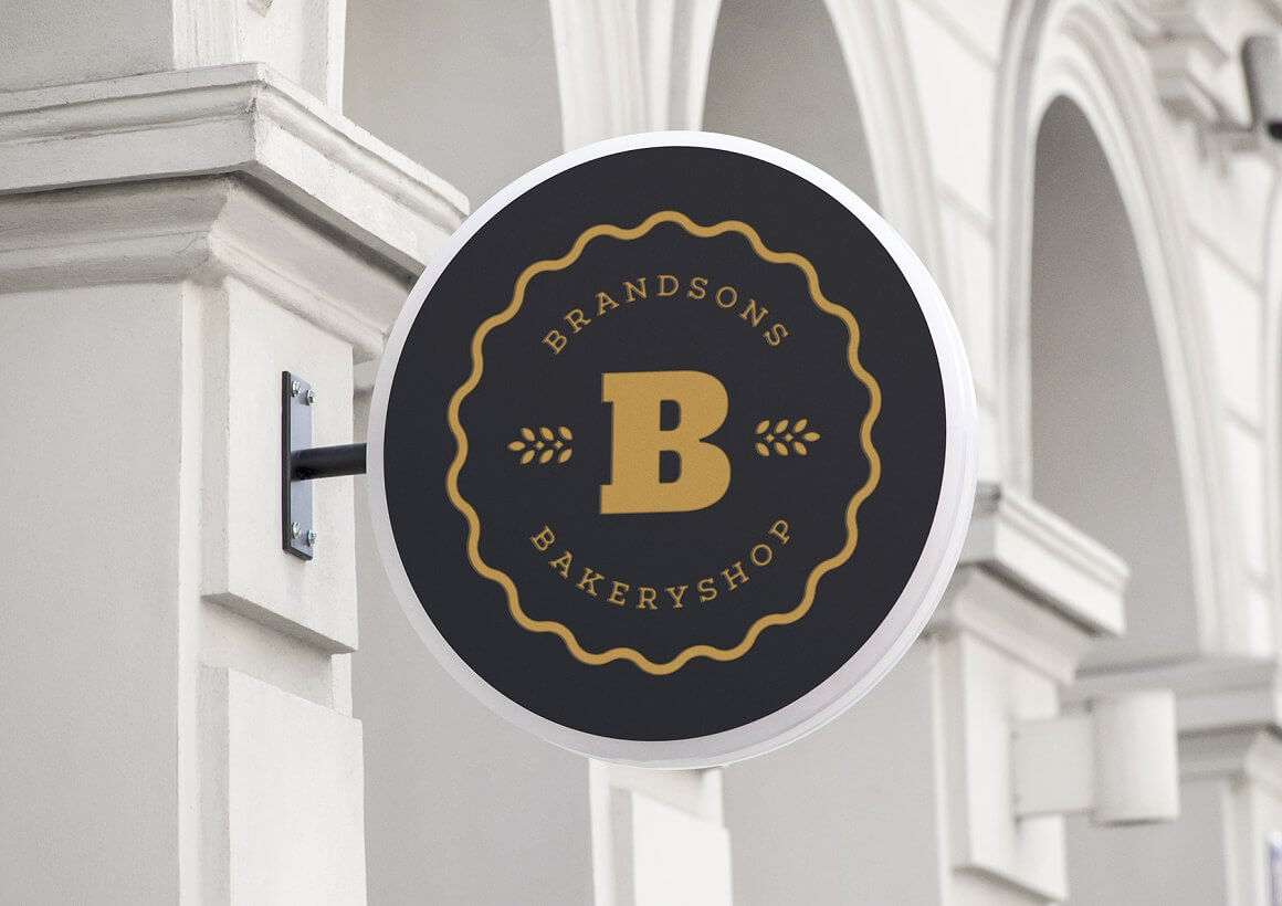 Large Brandsons Bakery Shop logo on round sign.