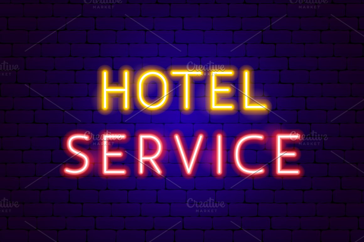The inscription hotel service in neon.