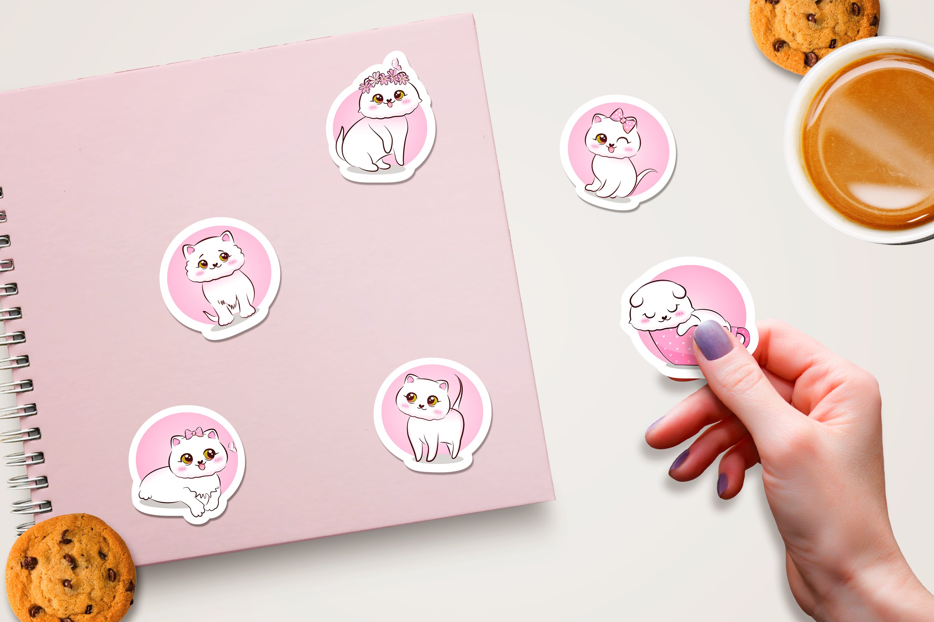 Female hand and cat stickers.