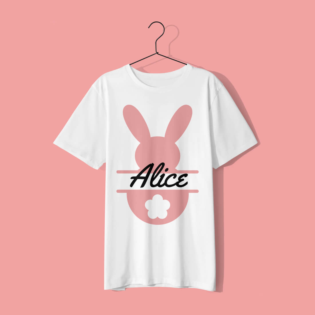 A pink rabbit with the name Alice is drawn on a white T-shirt.