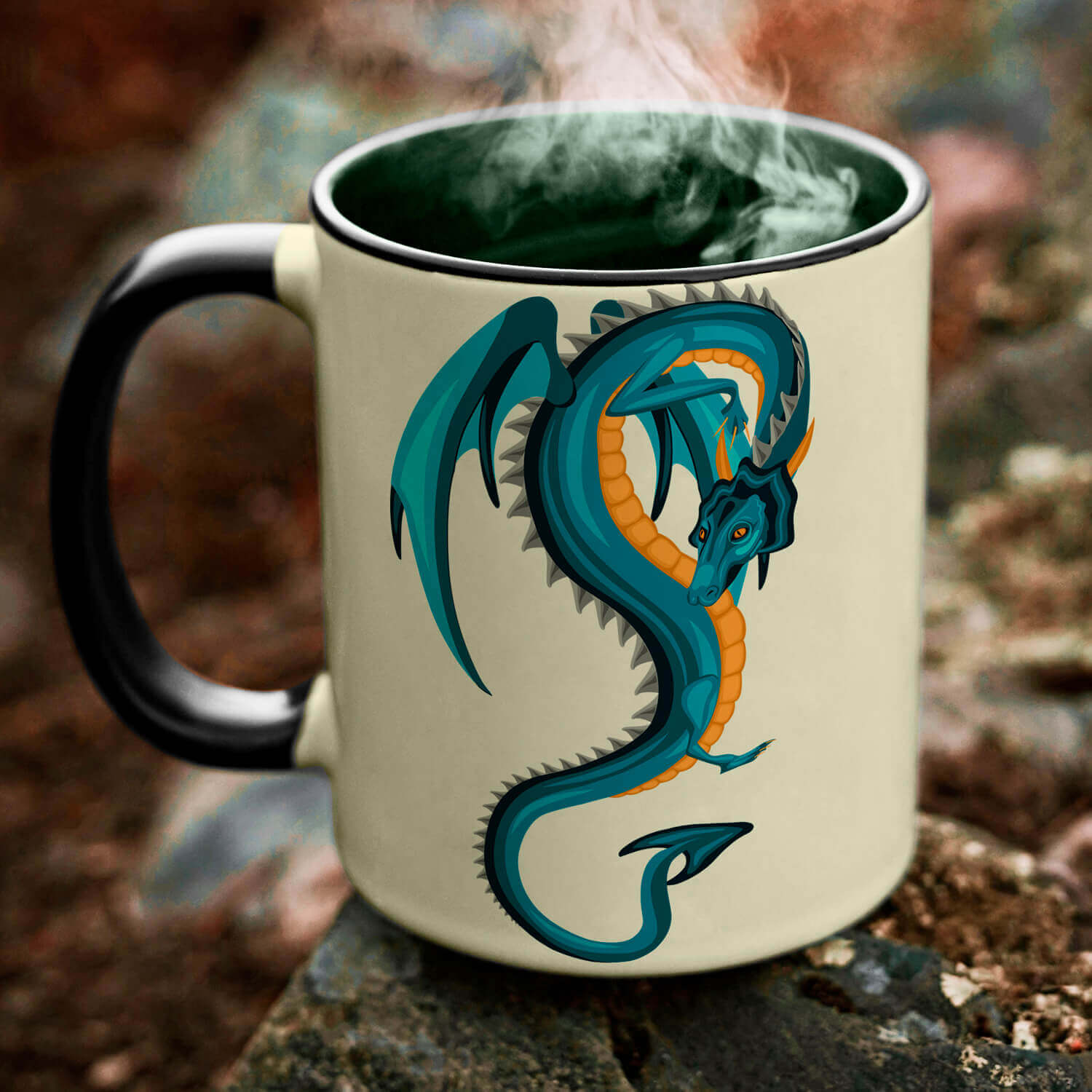 Coffee mug with a dragon painted on it.