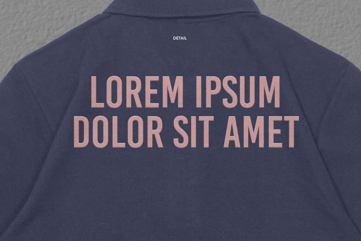 Dark purple t-shirt with pink lettering.
