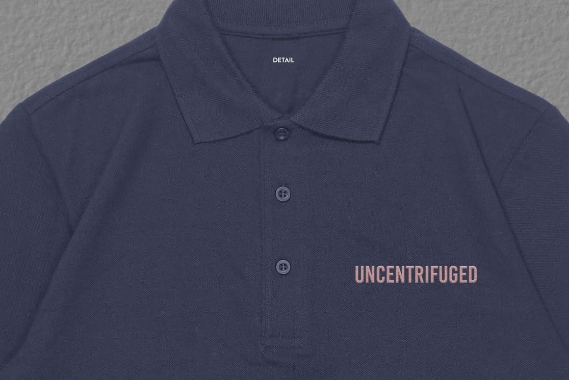 Purple men's t-shirt with two purple small buttons.