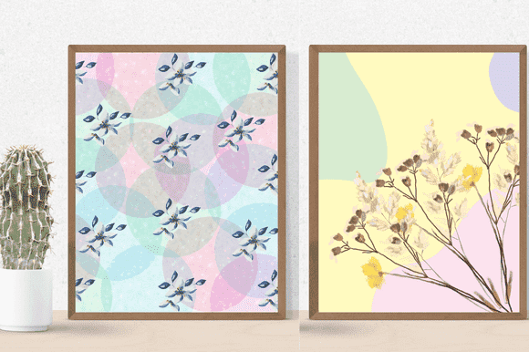 Two paintings with a soft pink and blue background with flowers painted on it.