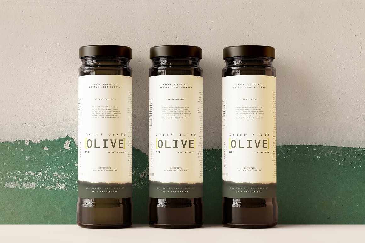 Three white labels on olive oil.