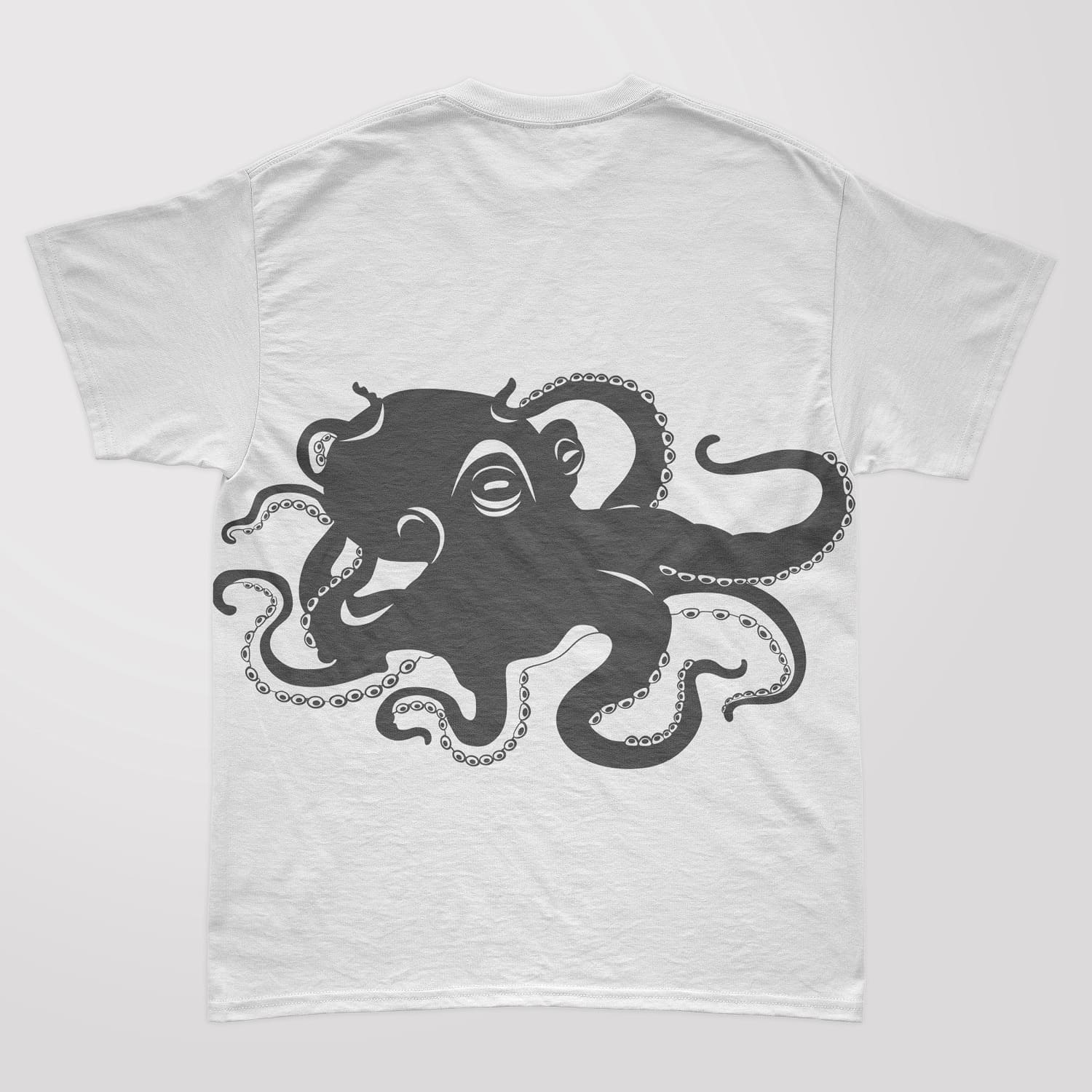 A white t-shirt with a gray silhouette print of a wide-spread octopus.