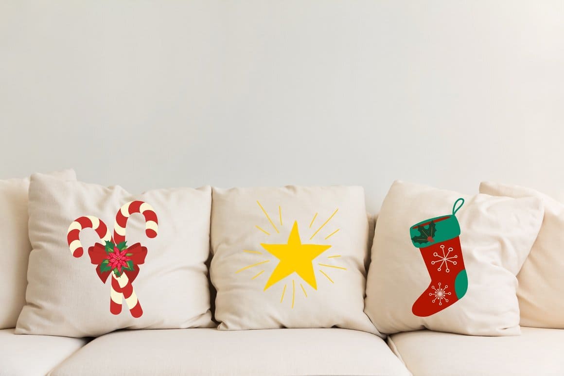 Image of three bright Christmas pillows. star, sock and sweets.