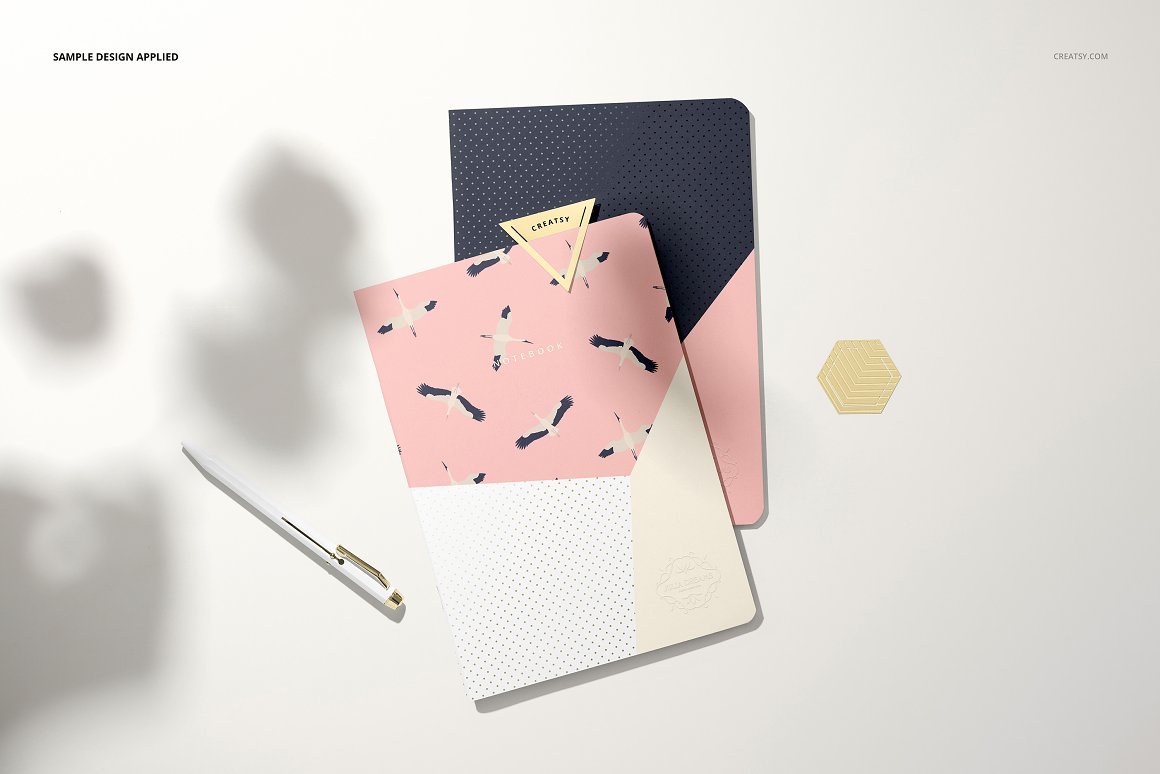 A notebook with a print or a diary.