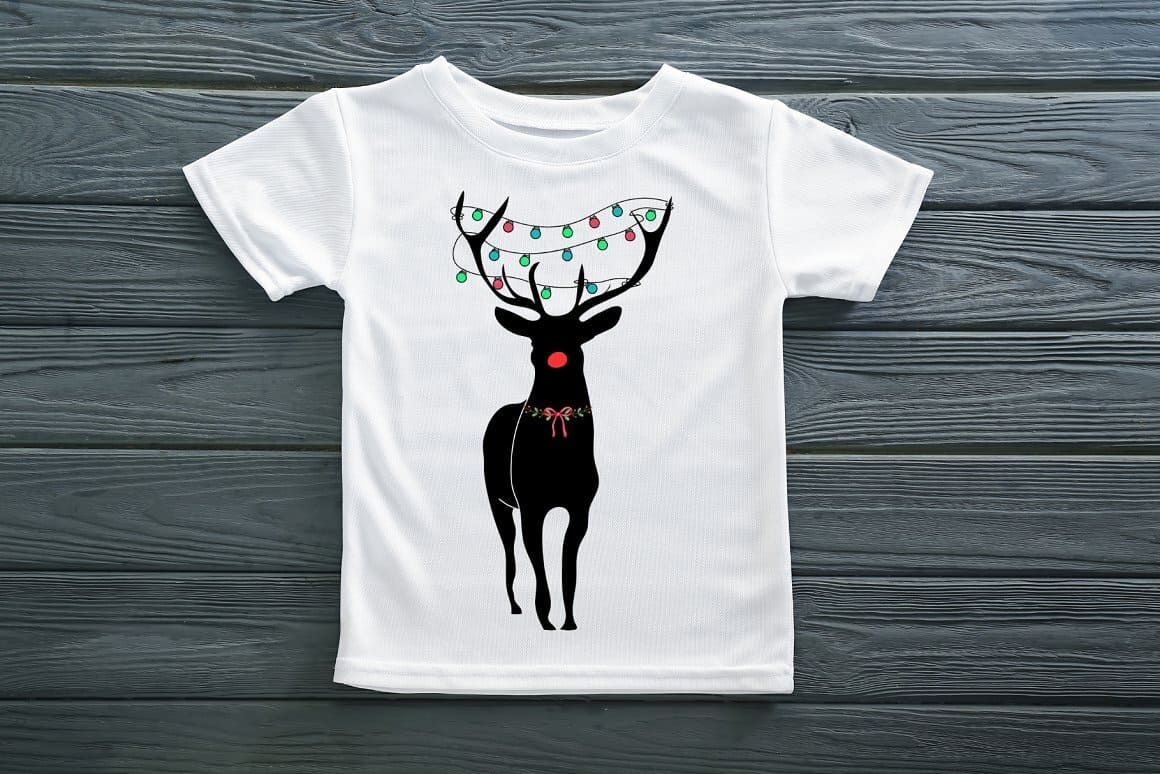 Image of a white t-shirt with the image of a Christmas deer.