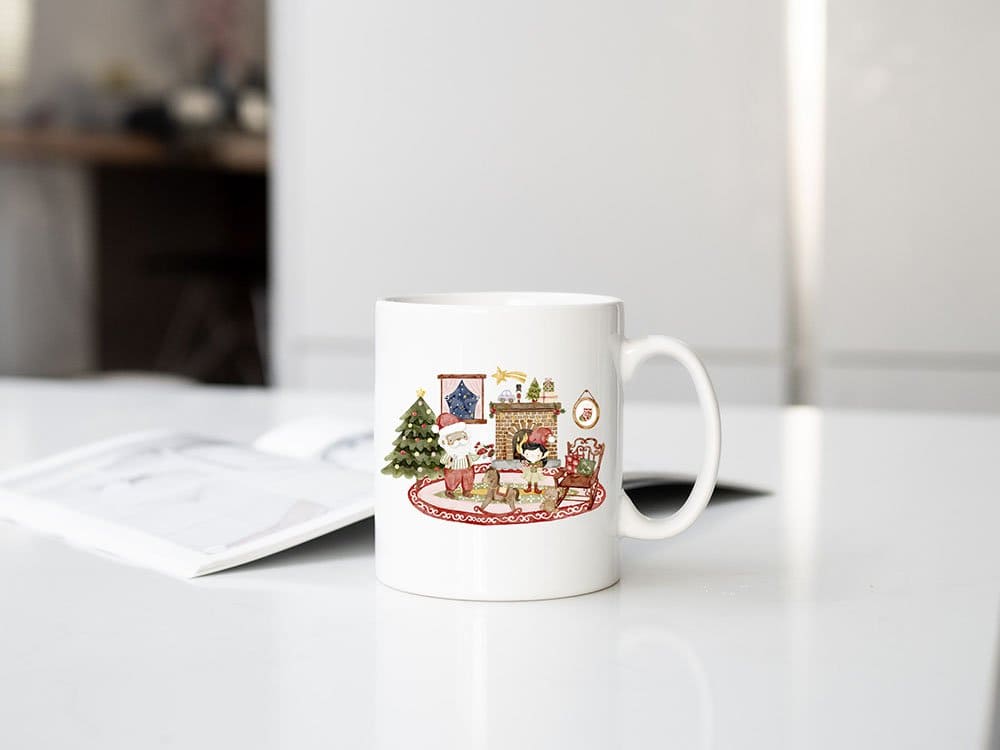 The picture shows a white cup with a Christmas story painted on it.