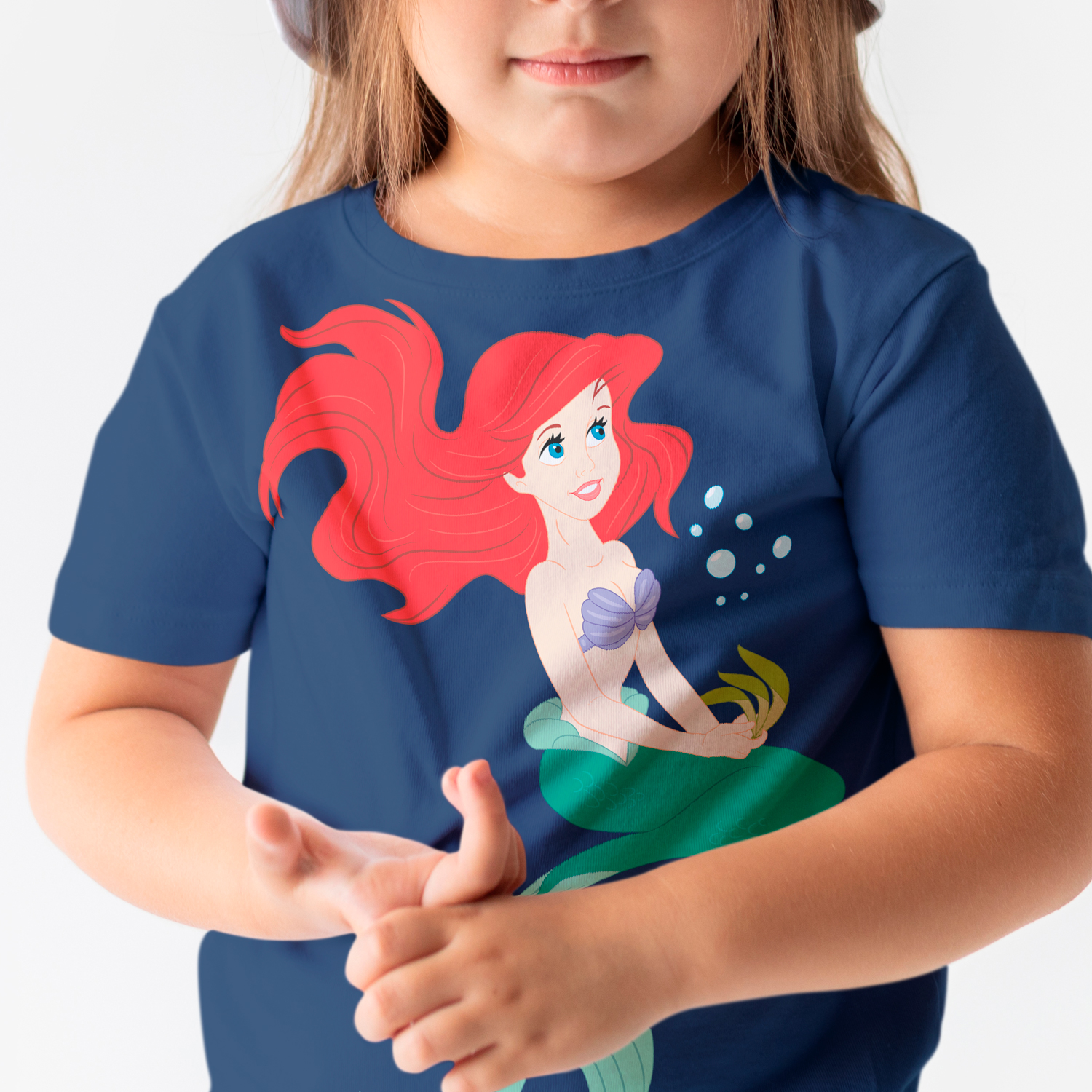 Print on a children's t-shirt with a mermaid.